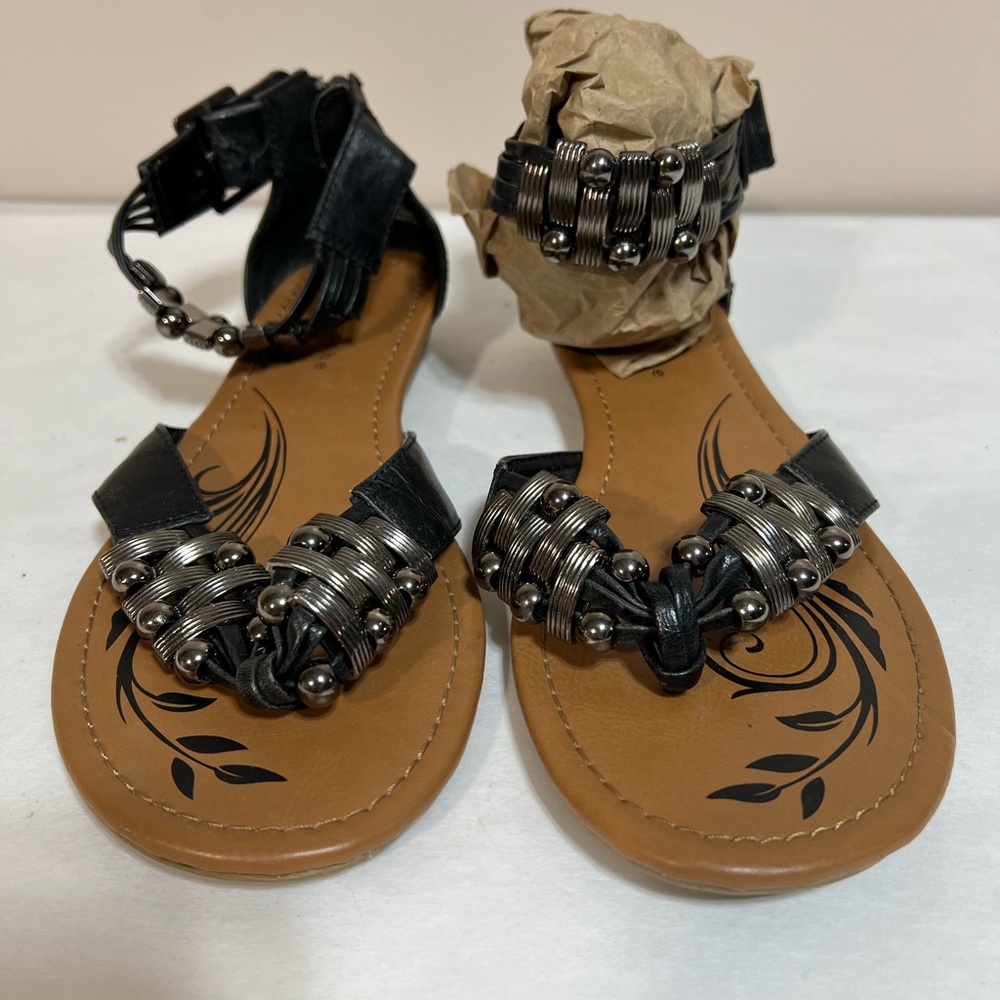 Women's size 8.5 black sandal with "gunmetal" color detail
